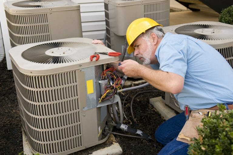 A/C Expert Working on AC System